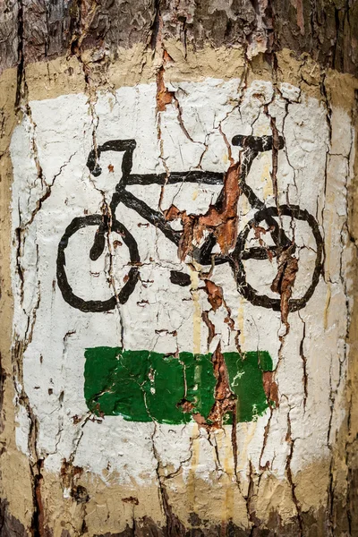 stock image Bicycle symbol on the tree as tourist track
