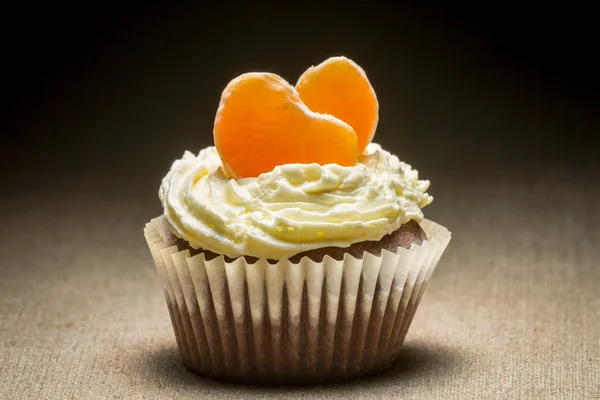 stock image Chocolate muffin with mandarin and vanilla cream