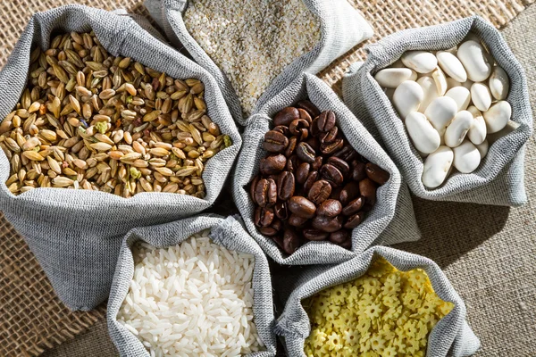 Stock image Several ingredients food in cloth bags