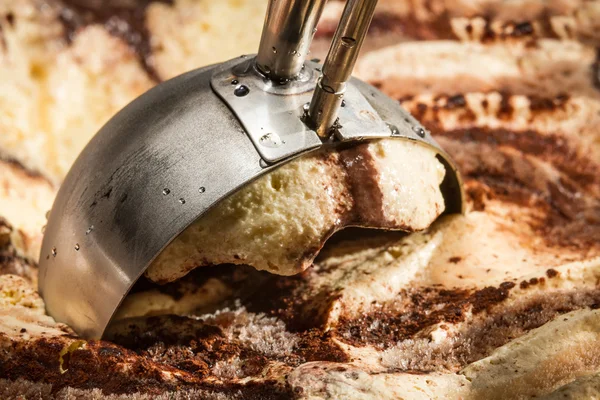 stock image Metallic spoon and scoop of ice cream