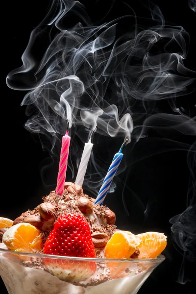 Blown off candle on birthday ice cream — Stock Photo, Image