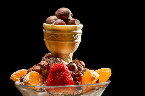 Creative ice cream with nuts and fruits — Stock Photo, Image