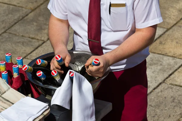 stock image Grabbing the wine bottles