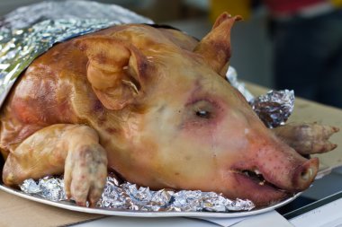 Dead pig ready to be cooked clipart