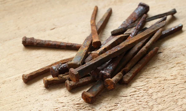 stock image Square nails for a round hole