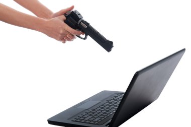 Women's hands with a gun takes aim at Laptop Monitor clipart