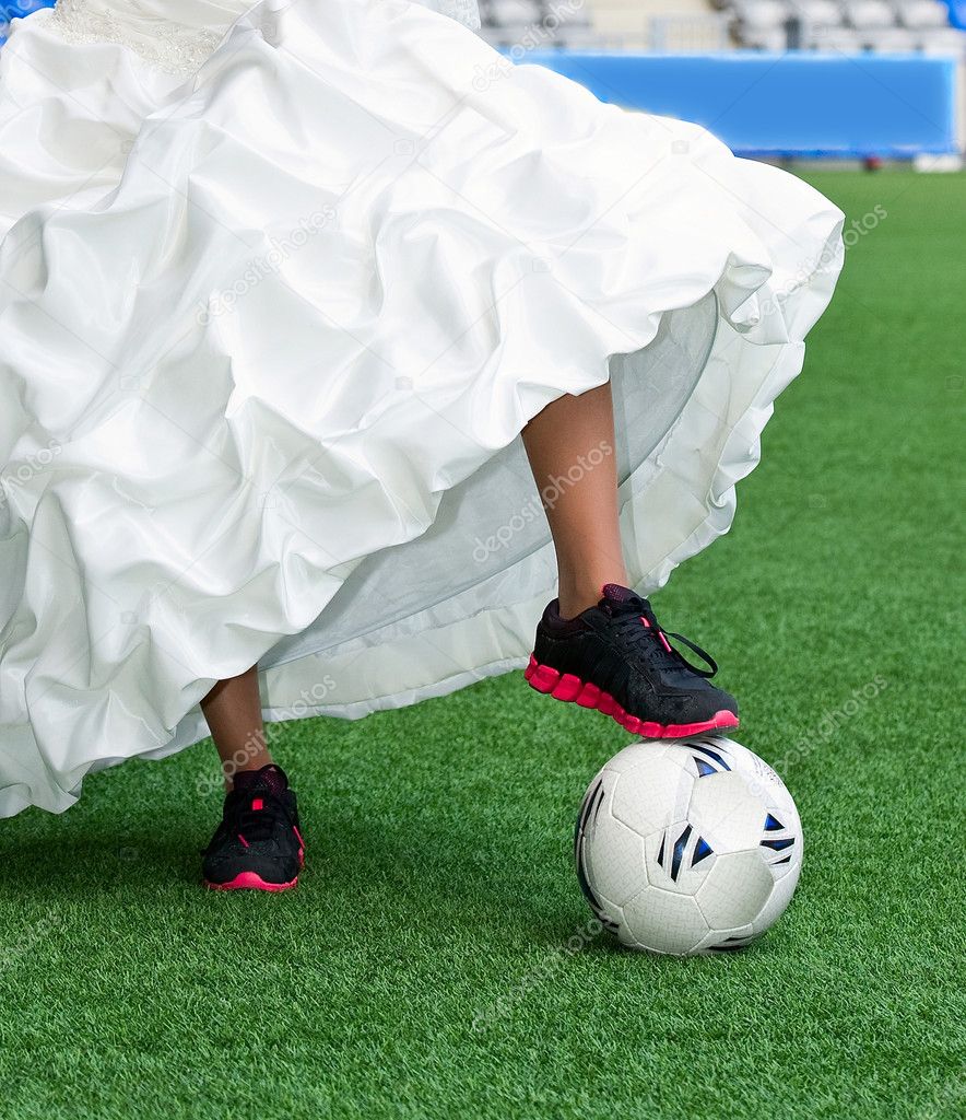 Bride playing football