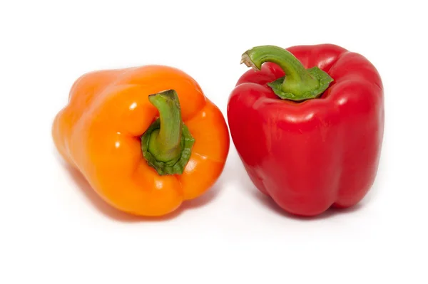 stock image Two juicy bell peppers on a white background