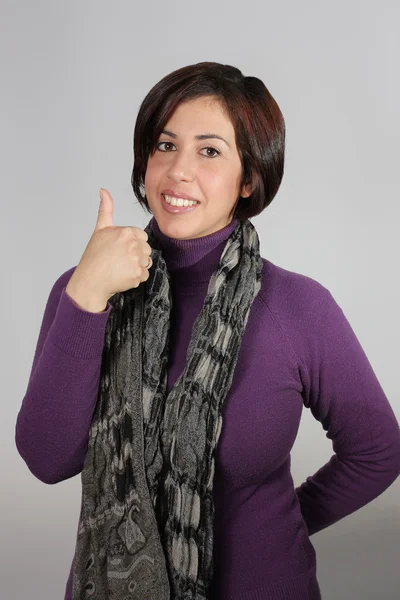 Woman with purple jacket and gray scarf — Stock Photo, Image