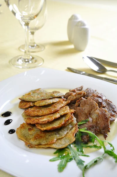 Lamb medallions with homemade potato pancakes, Czech cuisine — Stock Photo, Image