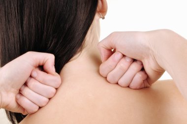 Neck massage - a young woman clipart