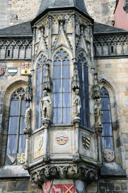 Detail windows and statue Old Town Hall, Prague clipart