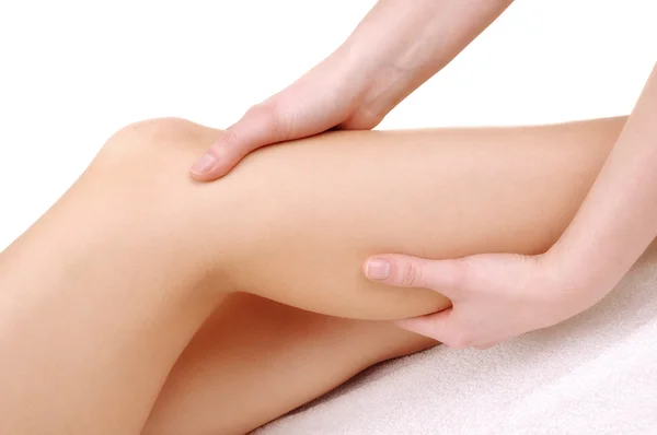 Massage the feet of a young woman — Stock Photo, Image