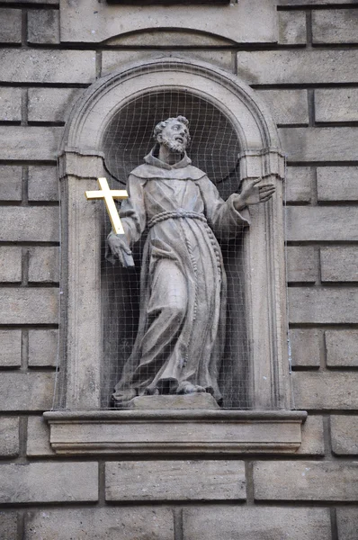 Sculpture of a saint in architecture in Prague — Stock Photo, Image
