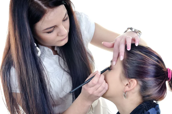 Make-up artist woman fashion model apply eyeshadow with brush — Stock Photo, Image