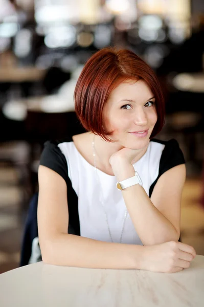 Portrait of beautiful woman with red hair — Stock Photo, Image