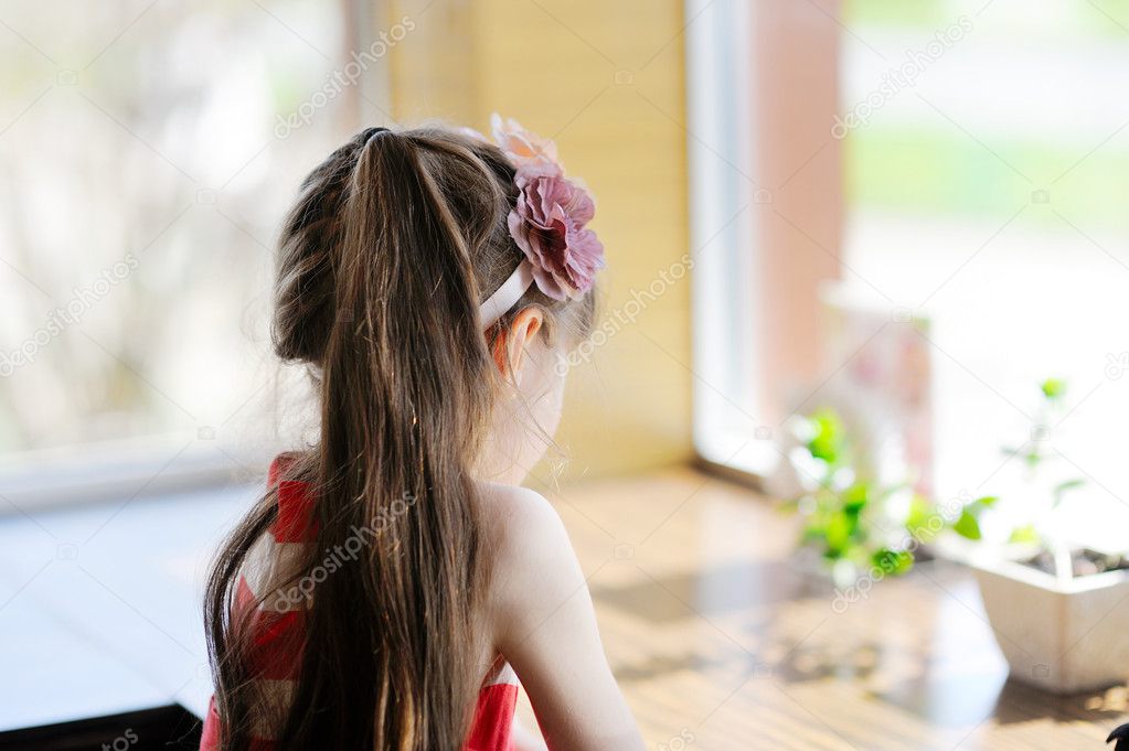 Little child girl facing away from the camera