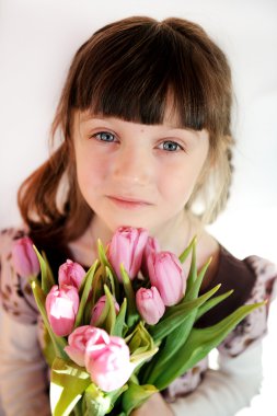 Portrait of child girl with tulips clipart