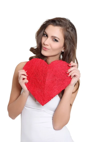 stock image Attractive girl posing with a heart sign