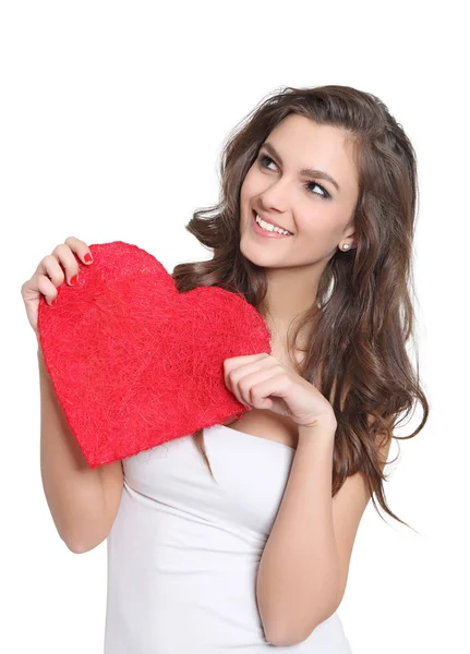 Young brunette holding a big love sign — Stock Photo, Image