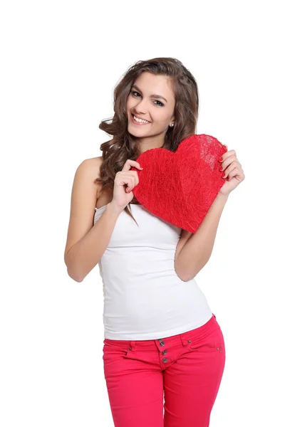 Cute girl holding a big heart — Stock Photo, Image