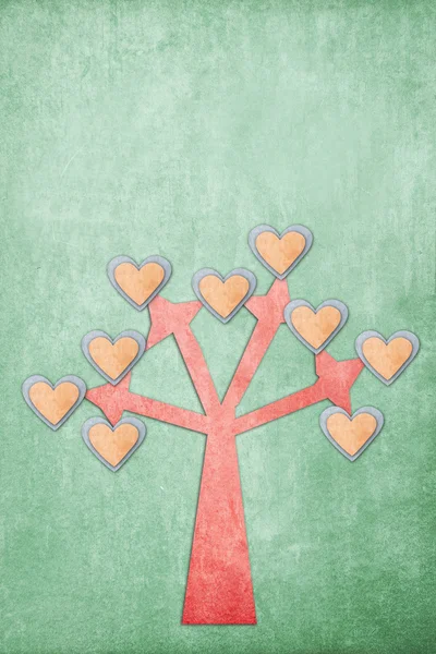Vara de coração de árvore em papel velho — Fotografia de Stock
