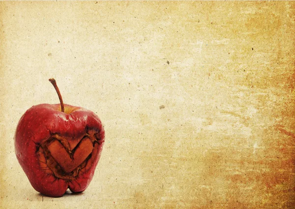 Srdce apple v staré papírové pozadí poznámek — Stock fotografie