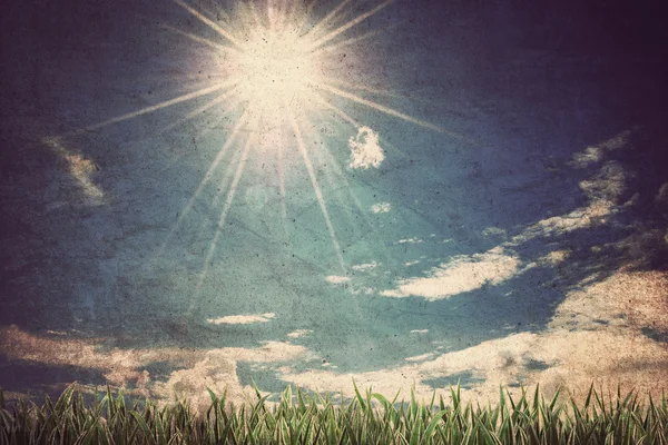 Gras en bewolkte hemel, vintage stijl — Stockfoto