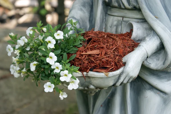 Statue with Flowers — Stock Photo, Image