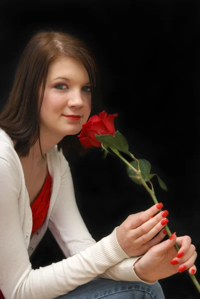 Femme avec une rose — Photo