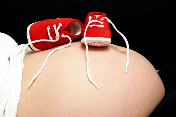 Moms Belly With Shoes — Stock Photo, Image