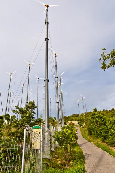 stock image Little road and wind turbines