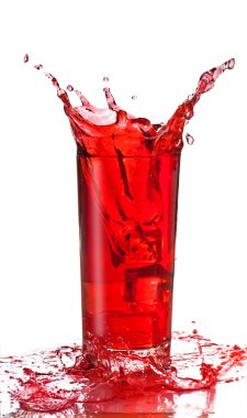 Fruit juice splash in a glass clipart