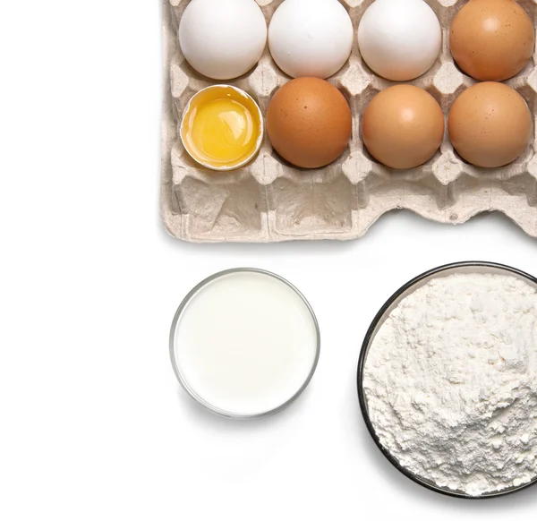Uova, bicchiere di latte e farina — Foto Stock