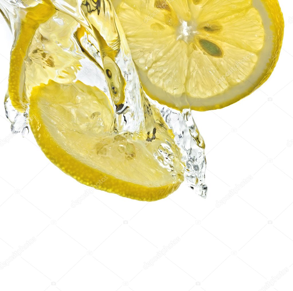 Lemon slices in water splash