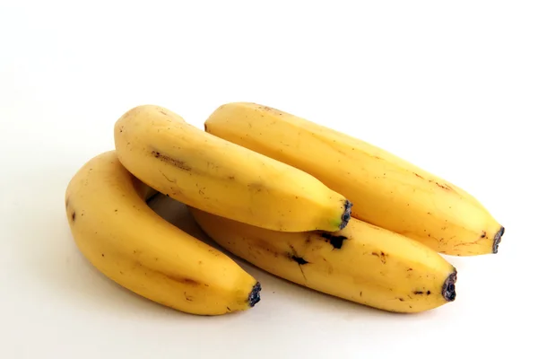 Four ripe bananas — Stock Photo, Image