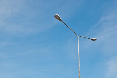 Street light pole on a sunny day clipart