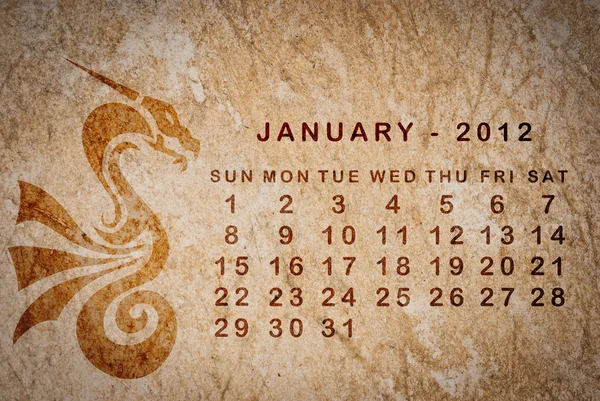 2012 year of the Dragon calendar on old vintage paper — Stock Photo, Image
