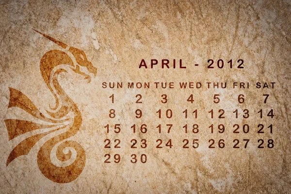 2012 rok kalendarza smoka na stary wzór papieru — Zdjęcie stockowe