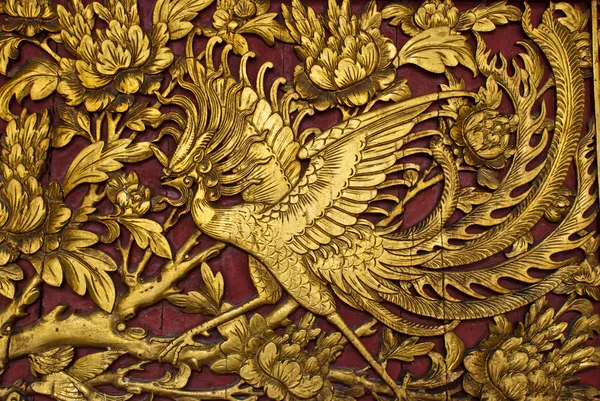 stock image Old phenix golden plate