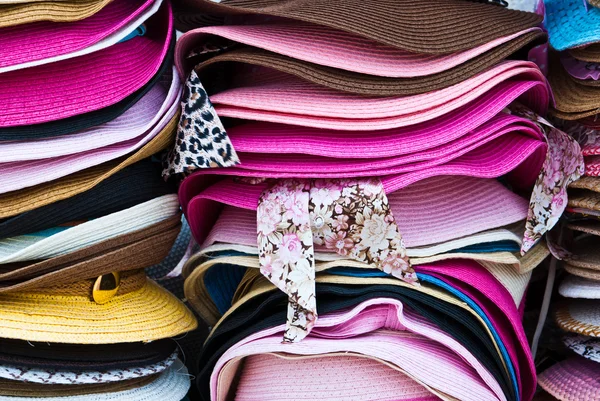 stock image Stacks of colorful summer hats