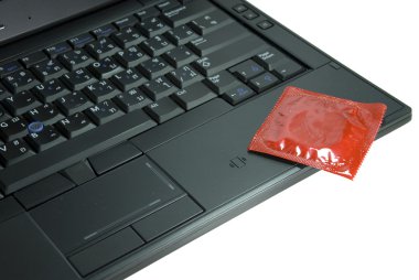 Condom on laptop clipart