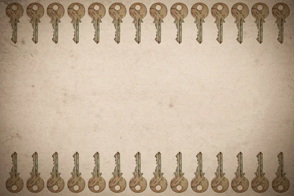 stock image Rusty keys on old paper background