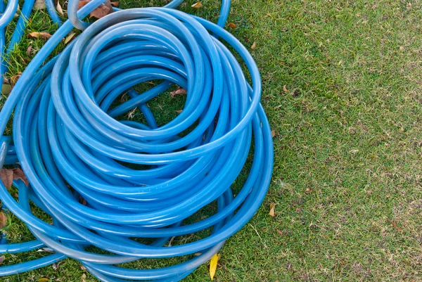 stock image Blue garden water hose stack together