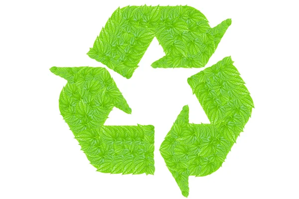 Reciclar símbolo hecho de hojas verdes — Foto de Stock