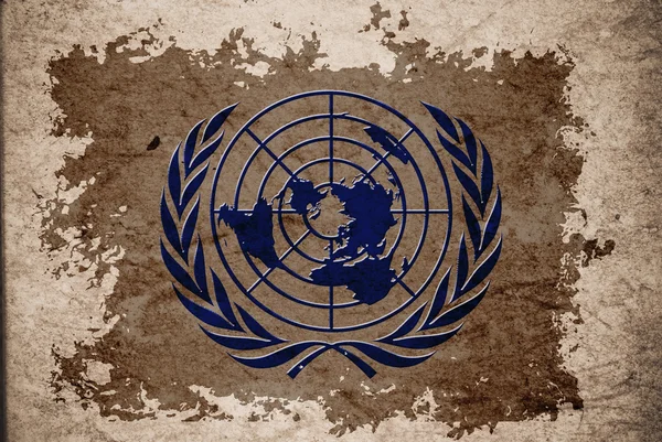Drapeau des Nations Unies ou de l'ONU sur vieux papier vintage concept de fond — Photo