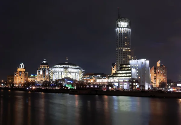 stock image Night buildings on the river embankment