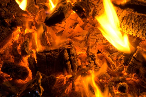 stock image Fire on pieces of wood