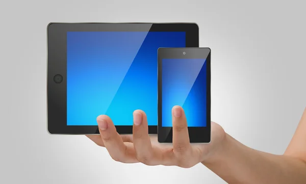 Touch pad, és a kezét a telefon — Stock Fotó