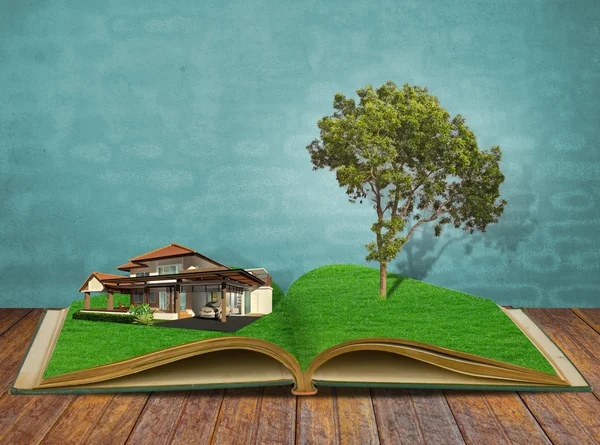 Livro mágico com casa e árvore — Fotografia de Stock